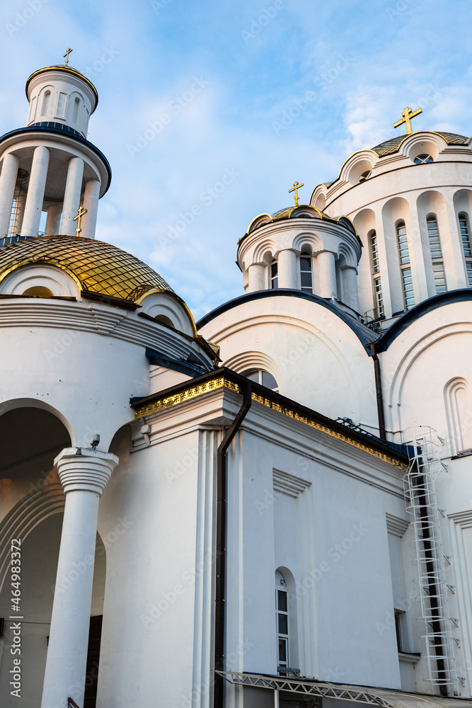 Wall mural walls of Church of the Cathedral of Moscow Saints in Bibirevo district of Moscow city on sunset