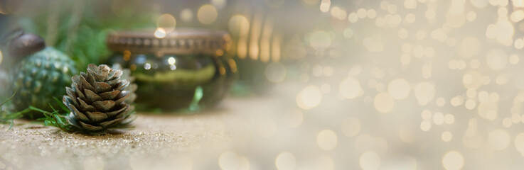 Christmas background - Advent time with candlelight and natural materials pine cones - Copy space, xmas card