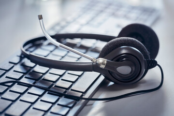 Headset on a desktop computer keyboard background