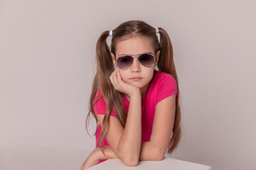 beautiful girl in sunglasses. advertising children's glasses