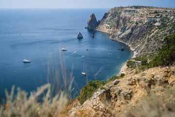 Fiolent , Crimea - sea landscape. Sea view - Mountains surround the bay and the small pleasure yacht boats moored in the lagoon