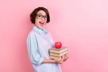Profile side photo of young woman happy positive smile excited reader learn knowledge books isolated over pastel color background