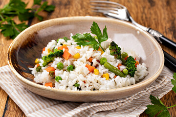 Bowl with tasty rice and vegetables
