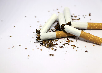 Stop smoking concept. Half and Half broken cigarette isolated on white background, Close up image of broken cigarette, World No Tobacco Day concept.