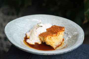 Homemade vanilla cake with chipped cream and caramel