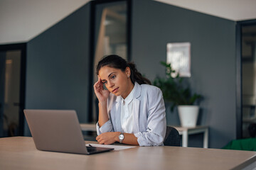 Fototapeta premium Adult woman, making sure her company is working well.