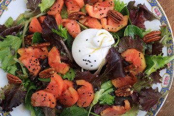 burrata with lettuce and tomatoes as italian food