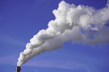 Environmentally harmful exhaust gases from a factory in northern Germany rise to the sky.