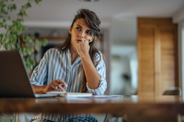 Adult woman, trying to help her company prosper.