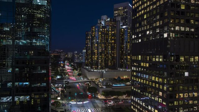 Timelapse looking down onto a busy Downtown Los Angeles street and hotel