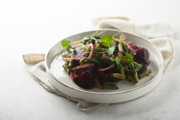 Healthy roasted beetroot salad with pickled cucumber