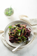 Healthy roasted beetroot salad with pickled cucumber
