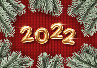2022 New Year card template with golden 3d numbers and pine branches on knitted background