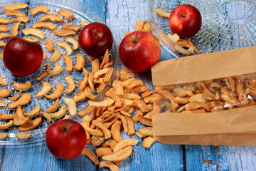 Dried apples slices. Dried Apples Slice. Grid for home drying of fruits and vegetables with dried apples slice. dehydrated fruits
