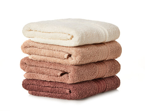 Clean towels stack on white background
