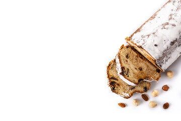 Traditional German Christmas stollen with fruit and nuts isolated on white background.Copy space