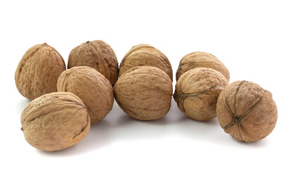 Several walnuts isolated on white background close-up