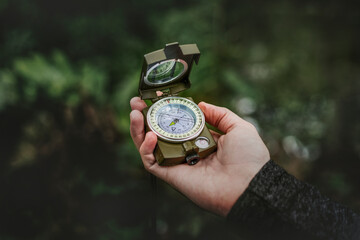 Adventure desktop wallpaper background, compass on hand, vivid tone © Rawpixel.com