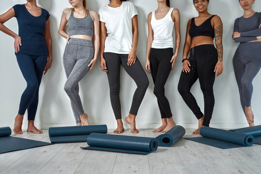 Low angle of diverse women in sportswear before training