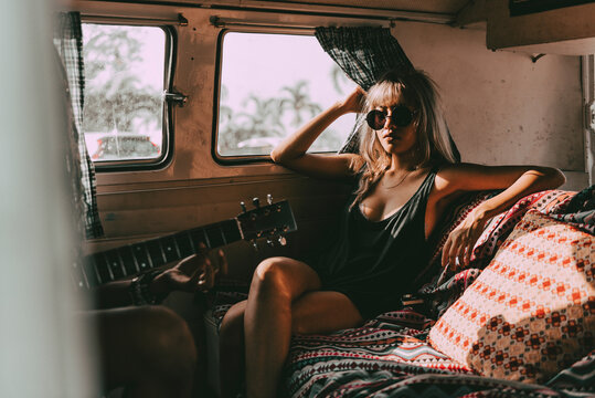 Aesthetic woman road trip portrait, travel influencer in a van - Powered by Adobe