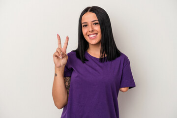 Young caucasian woman with one arm isolated on white background showing number two with fingers.