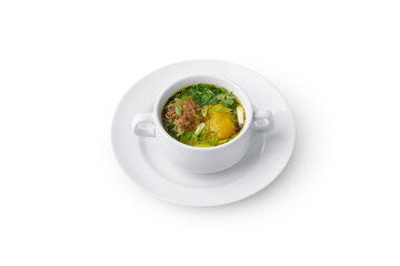 Chicken soup with potato and herbs isolated on white background