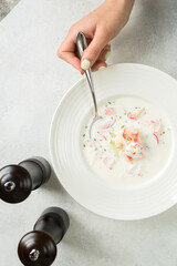 okroshka with crab in the restaurant