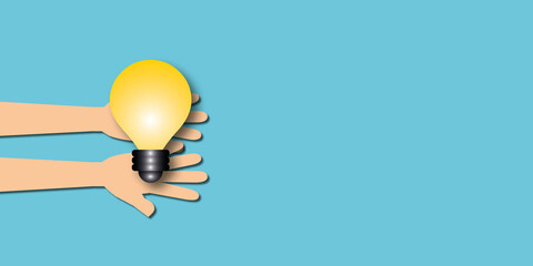 Hands holding light bulb on pastel blue background, Ideas inspiration concepts of business start up or goal to success, Creativity of human, space for the text, paper art design style.