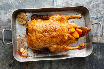 Roasted whole duck with vegetables