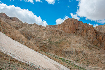 Aladaglar National Park (glacial landscape). Cloudy mountain landscape.
Reflections in the lake.
Trekking walks. Flowery mountain landscape.Trans transitions. Nigde, Turkey.