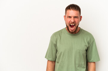 Fototapeta premium Young caucasian man with diastema isolated on white background shouting very angry, rage concept, frustrated.