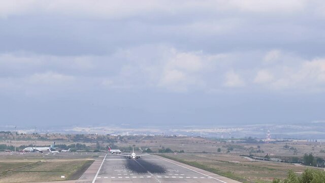 HD Footage of an Airbus A321 of Iberia airlines taking off from the runway of Madrid Barajas Airport with a strong side wind