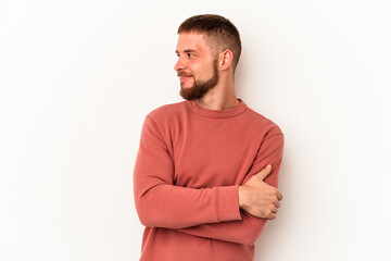 Obraz premium Young caucasian man with diastema isolated on white background laughing and having fun.