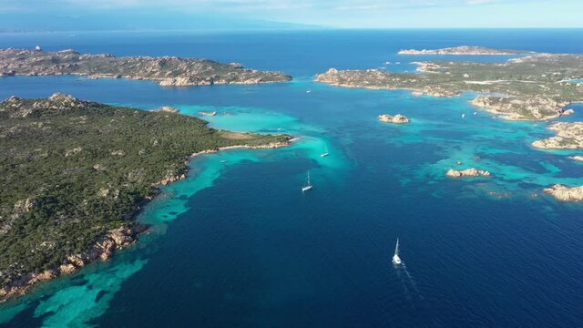 View from above, stunning aerial view of La Maddalena archipelago with Budelli, Razzoli and Santa Maia islands bathed by a turquoise and clear waters. Sardinia, Italy.