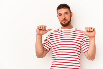 Fototapeta premium Young caucasian man with diastema isolated on white background feels proud and self confident, example to follow.