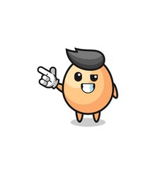 egg mascot pointing top left