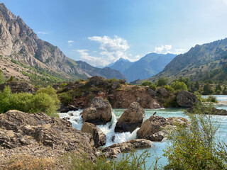Mountain waterfall in Saritag near Iskanderkul lake in Tajikistan