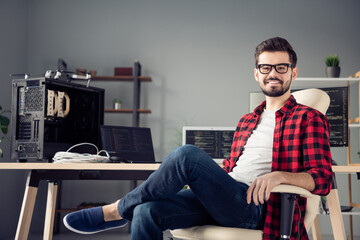 Portrait of attractive smart clever cheerful guy hacker remote support assistance company director...