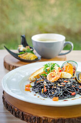 Fototapeta na wymiar black pasta with seafood