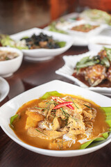 Meat fried with chili pepper and red curry sauce