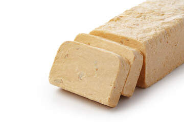 Turkish dessert halva slices isolated on white