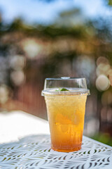 Ice tea in plastic cup