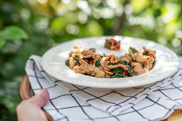Stir-fried meat with chili and basil