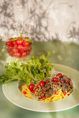 Spaghetti with minced meat and vegetables