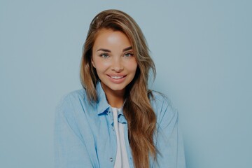 Portrait of attractive young woman with long straight light brown hair