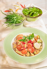 Traditional thai cuisine spicy green papaya salad