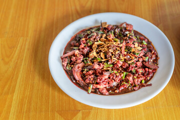 spicy minced meat with mixed vegetables on dish