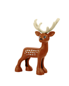 Plastic deer toy isolated on white background.
