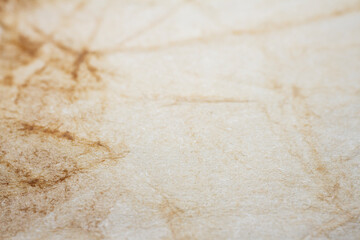 Extreme closeup of biege handmade paper
