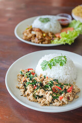 Stir-fried meat with chili and basil
